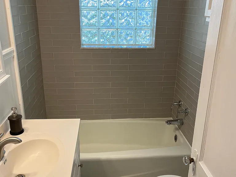 Remodeled bathroom, new shower tile and floor tile.