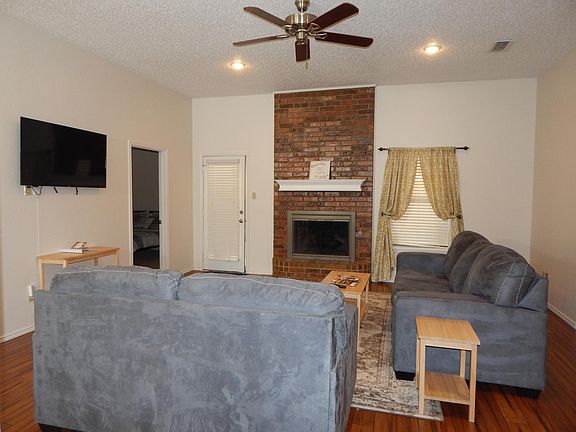 Large living room with hardwood floors