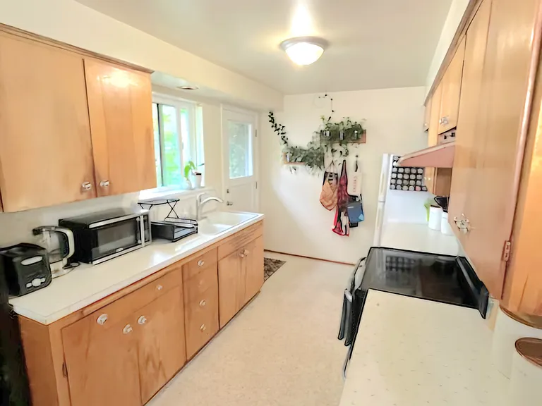 Side door in kitchen - access to backyard