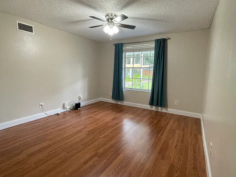 first bedroom with huge window