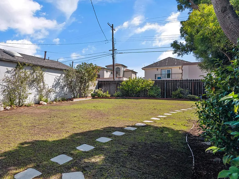 Newly planted large enclosed back yard