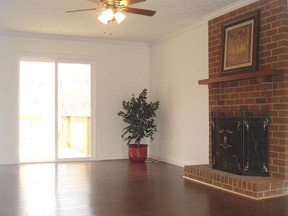 Great Room with Brick Wood Burning Fireplace