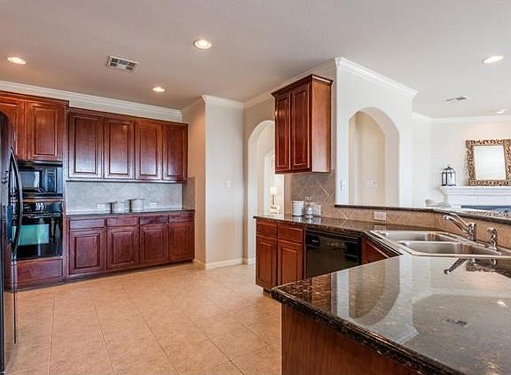 Huge kitchen with granite, gas cook top & lots of storage.