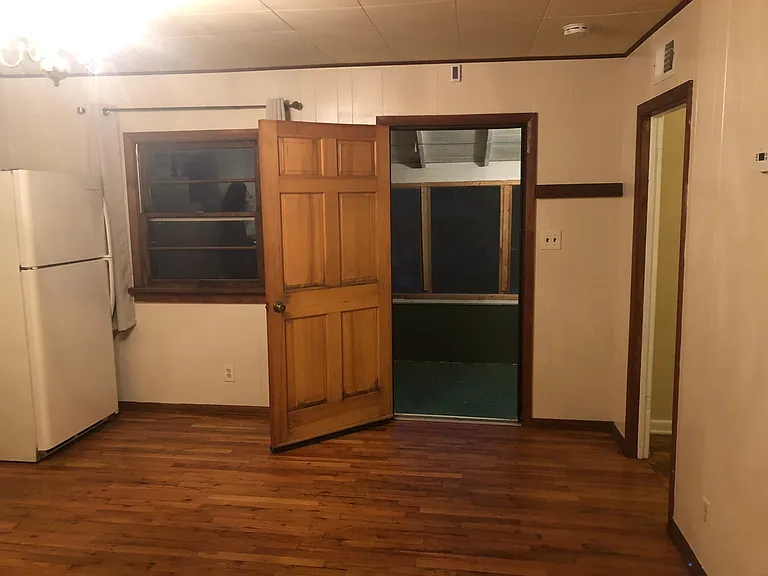 Front door leading to porch
