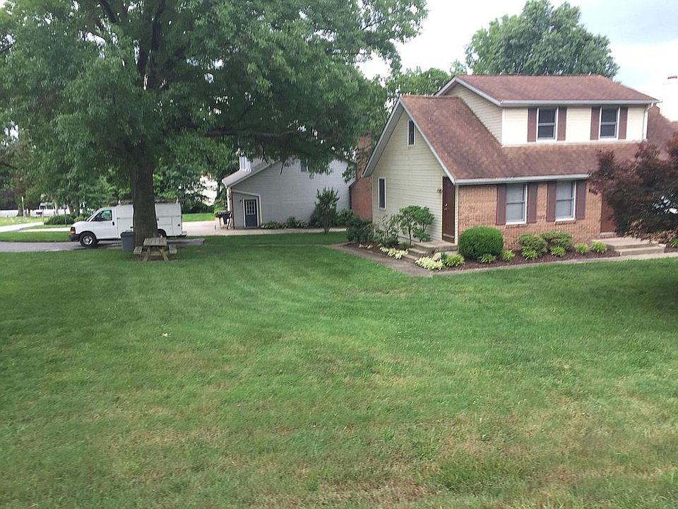 View of front of house. Private driveway and unit entrance i