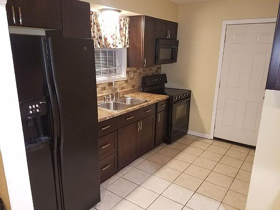 Kitchen- Stove, microwave, and refrigerator