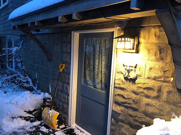 Side door into the mudroom and finished basement.