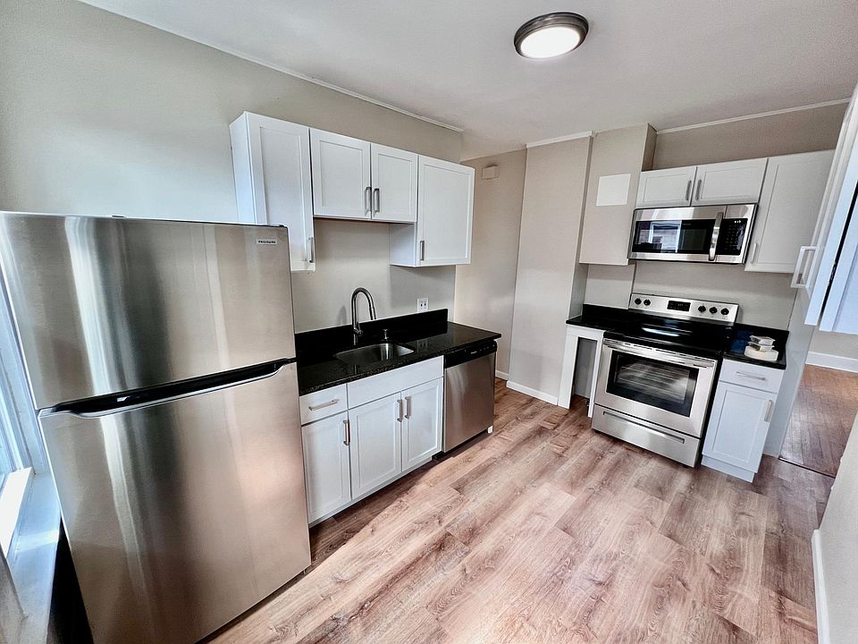 Renovated eat-in kitchen with new stainless appliances