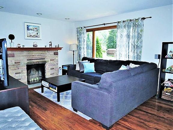 Stone fireplace, HW floors