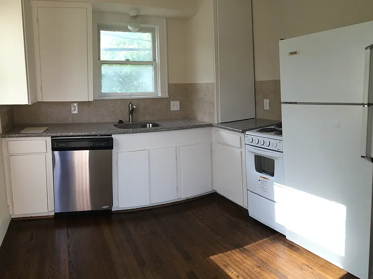 Kitchen with Dishwasher, disposal, electric stove.