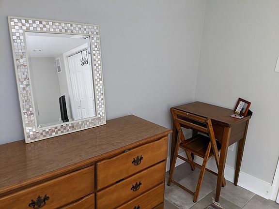 Desk space set up in bedroom.