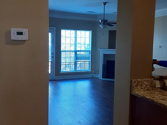 Open Living Room with Fireplace, that open to a back deck