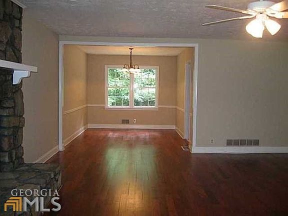LIVING ROOM WITH VIEW TO FORMAL DINING ROOM!