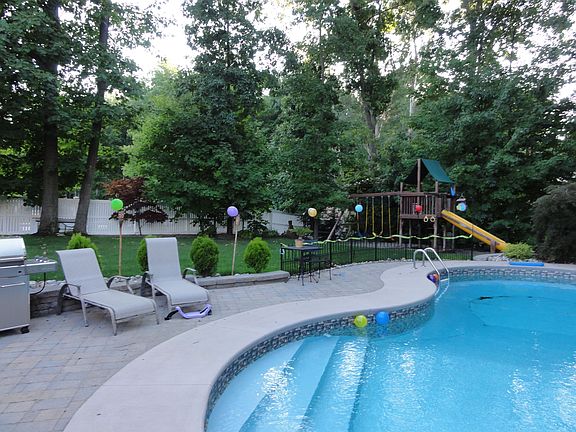 custom pool with patio