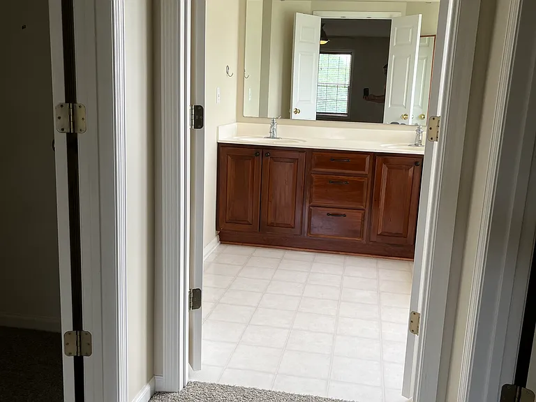 Master bathroom 
Her and his walk in closet on each side
