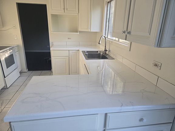 New flooring and countertops.