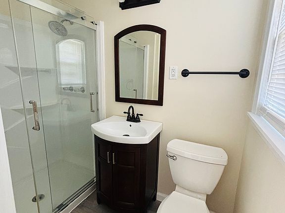 Bathroom off primary bedroom