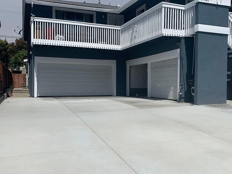 new paint and concrete on entire building