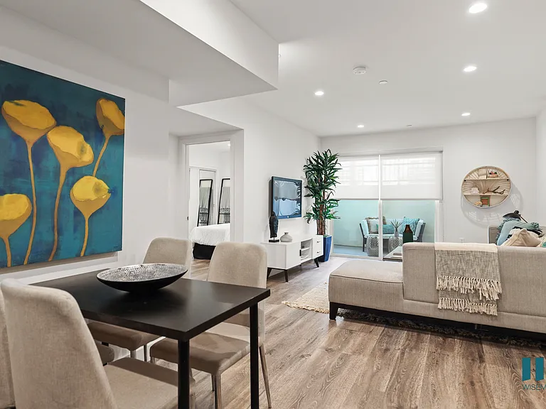 Open-Concept Living and Dining Areas with Patio