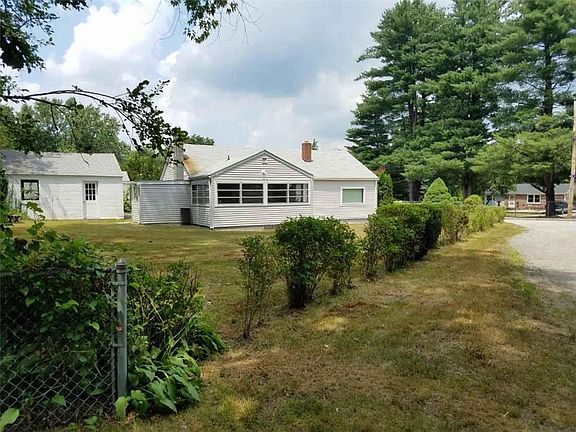 Exterior Side. Features Large Corner Lot.