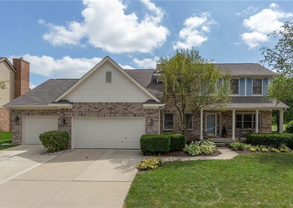PARKS PLACE  in West Carmel...highly desirable location and neighborhood. Beautiful private setting , 3 car and Master on Main and added oversized 3rd stall garage. WOW