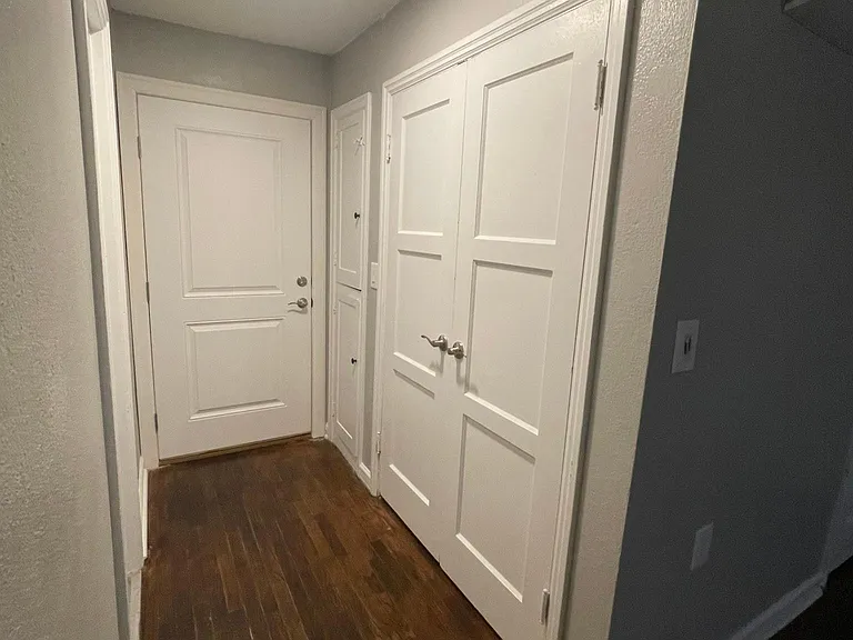 Hallway with a closet