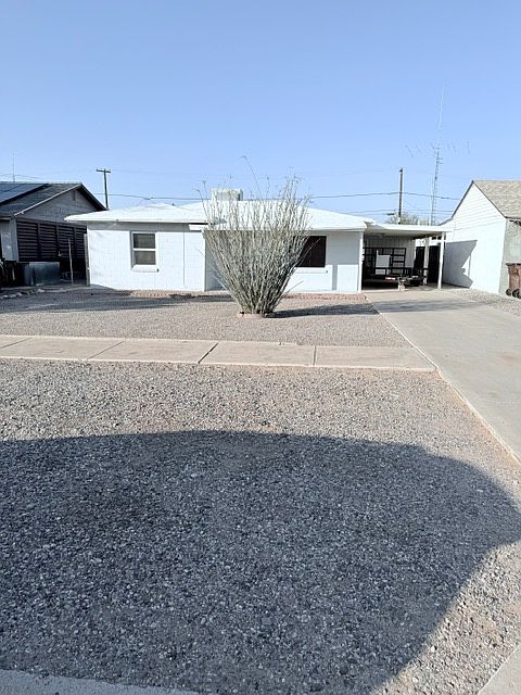 long drive way and parking area.
