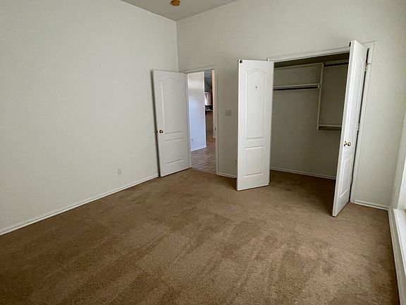 Front bedroom - large and fits queen size bed, desk, and side tables. Large double door closet.