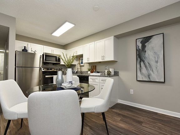 Dining Room + Hardwood Style Flooring