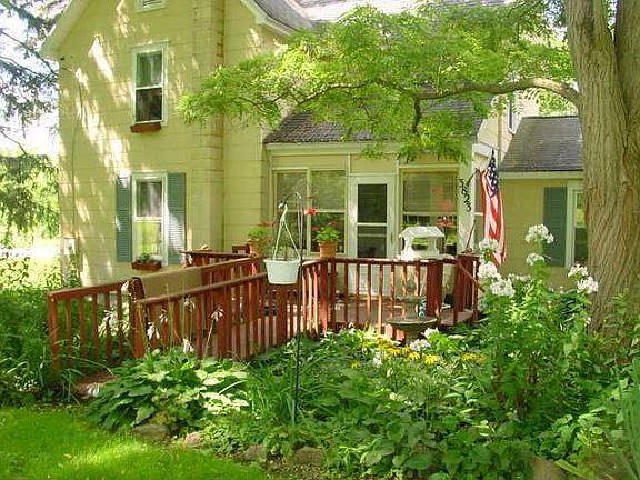 inclosed porch with outside deck