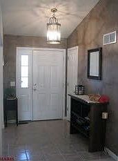 Inviting Foyer with Ceramic Tile