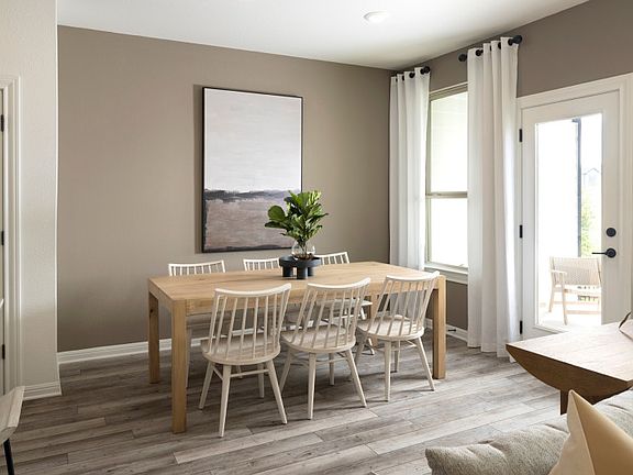 Dining Space with Backyard Patio Access
