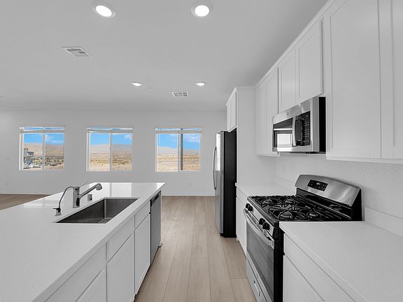 Upstairs Kitchen with facing Strip Views