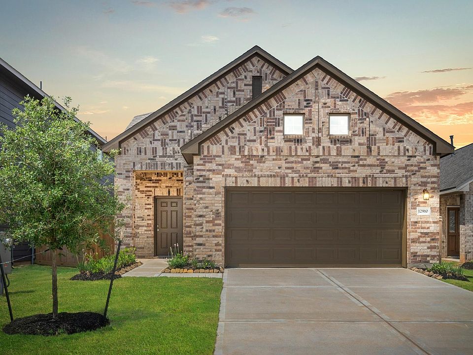 Welcome home to 12910 Lime Stone Lane located in the Stonebrooke community in Conroe.