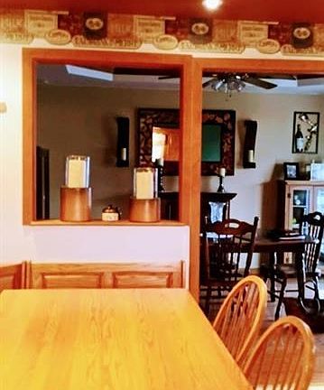 Additional view of kitchen showing entrance to dining area.