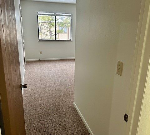 primary bedroom just off entryway