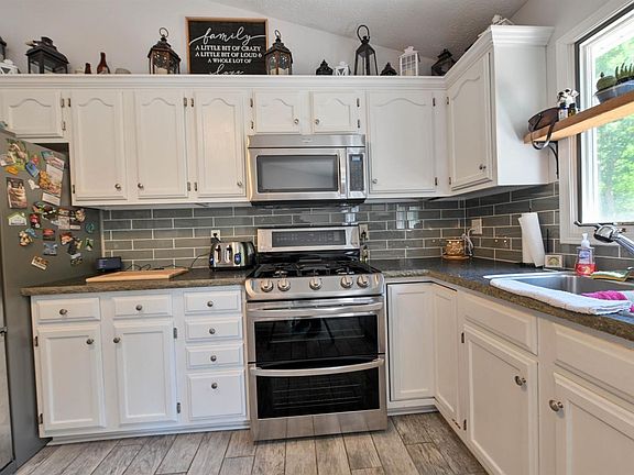 5th image of 18552 Whispering Woods Dr Lot 31