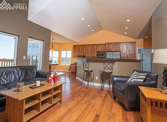 An open "Great Room concept" allows for an easy flow design with vaulted ceilings and recessed light