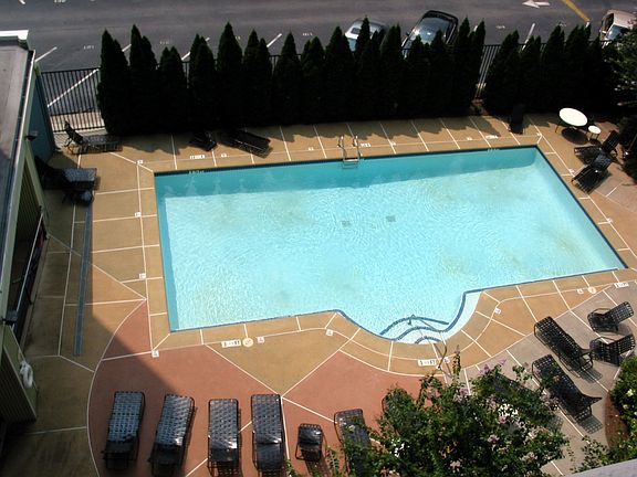 This unit has a view of the pool.