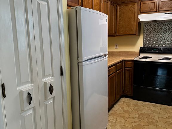 Kitchen (left side angle) with large food pantry