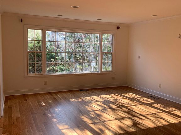 Family room with working fireplace wired for TV and sound system