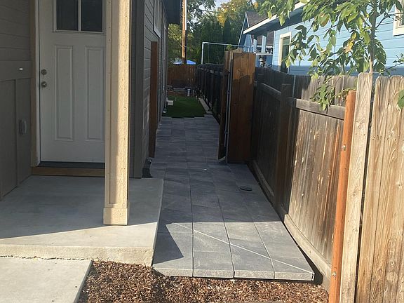 Paved walkway for easy access from front to back.