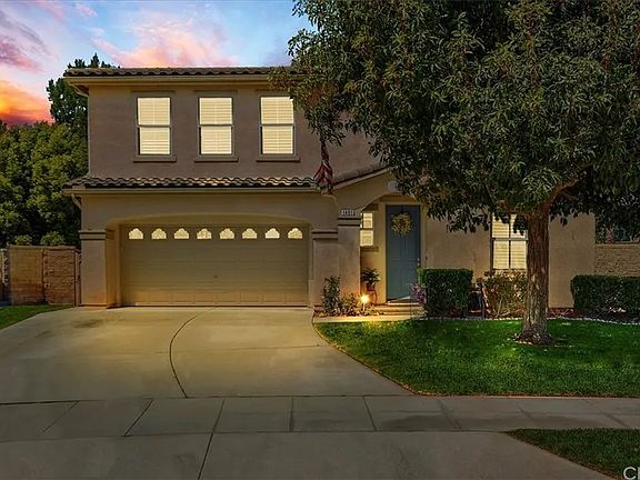 Charming two-story home in the desirable Huntington at the Colonies community