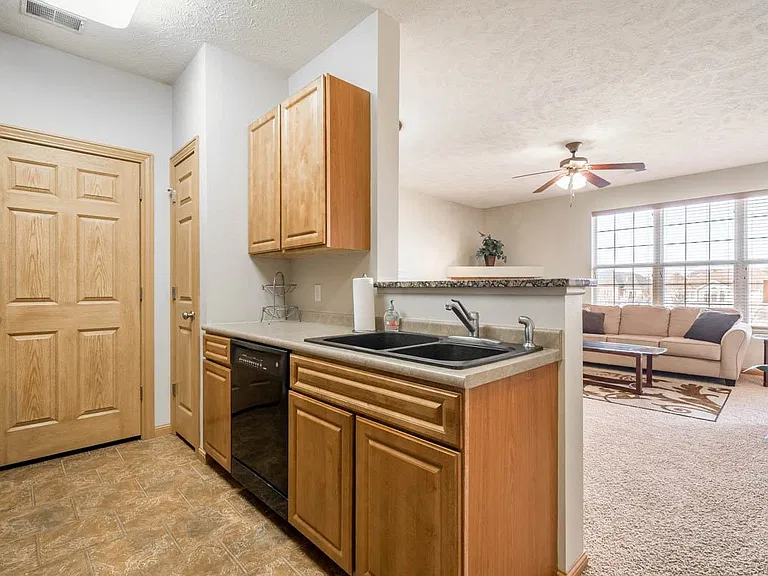 Our kitchens are designed with functionality in mind, offering plenty of counter space and storage for all your culinary needs.