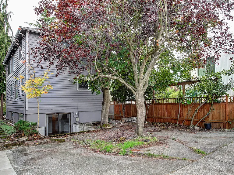 Backside of the home has two parking spots accessible by alley