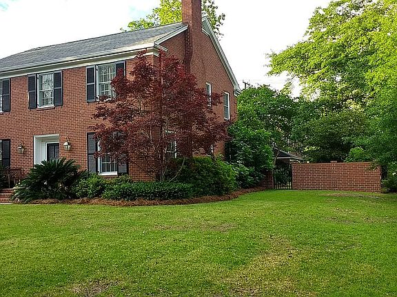 Brick wall around backyard