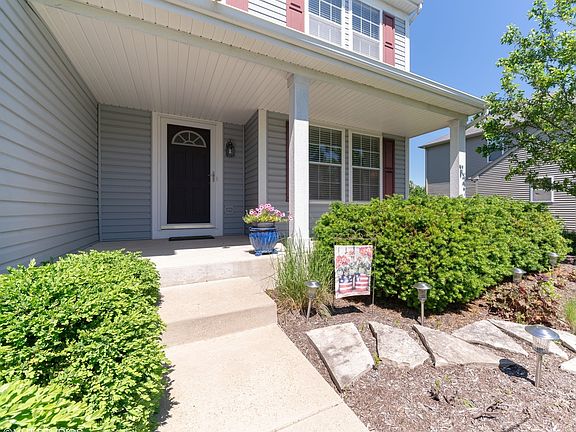 Room for two chairs on the front patio to the right of the front door
