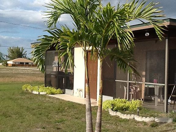 Rear screened patio.