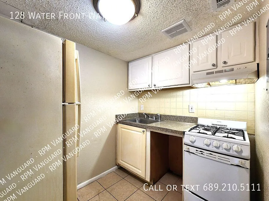 Ground Floor Condo Unit; Screened-in Patio; All-Tile Flooring; Water Included — Photo 4