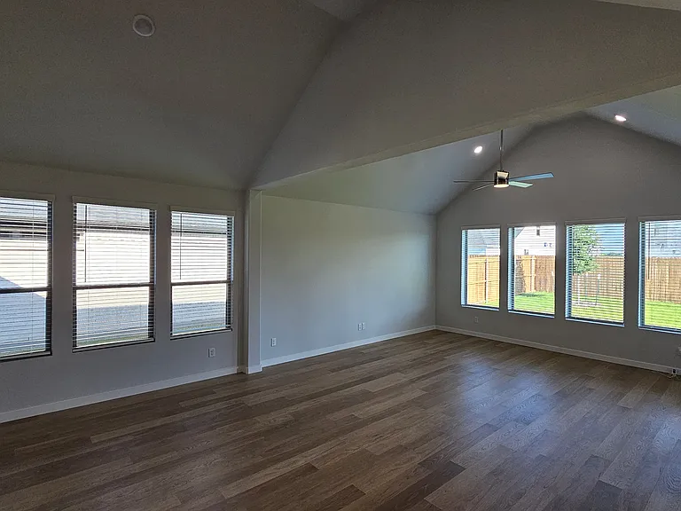 A dedicated dining space conveniently located between the kitchen and living area for seamless family meals